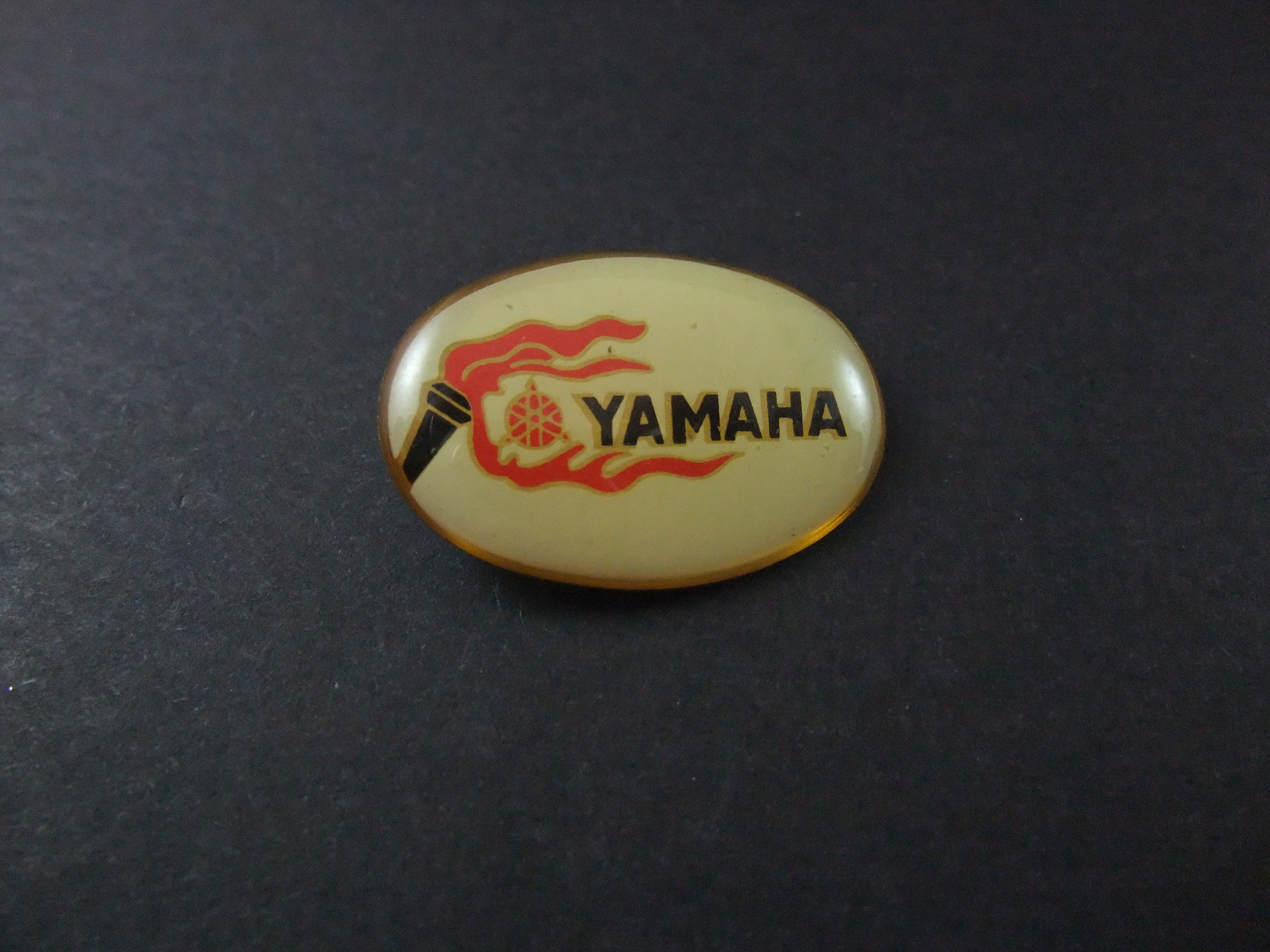Yamaha motor fakkel met logo